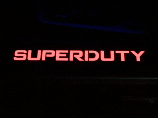 Ford Super Duty 99-16 Illuminated Door Sill Black Finish in Red Illumination