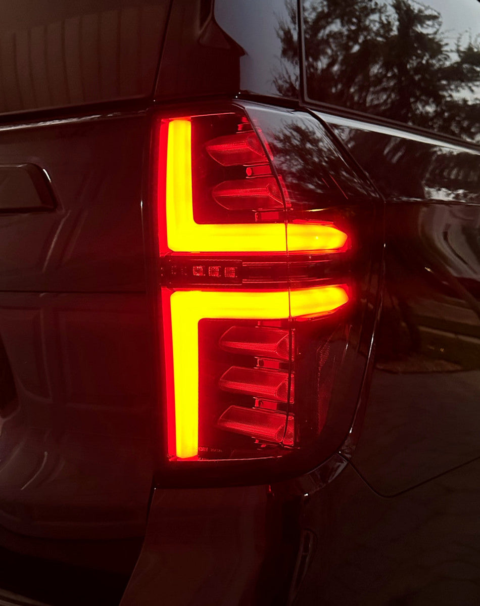 Chevy Tahoe & Suburban 21-24 OLED TAIL LIGHTS with LED Startup Sequence & AMBER OLED Turn Signals - Smoked Lens