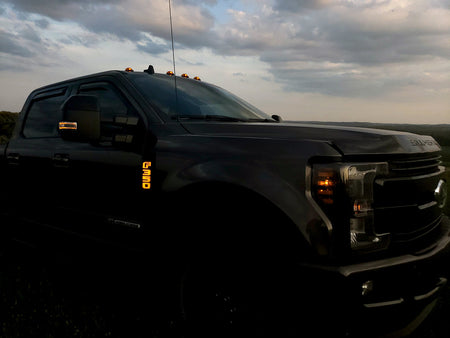 Ford F250 17-19 Illuminated Emblems Black Chrome in amber