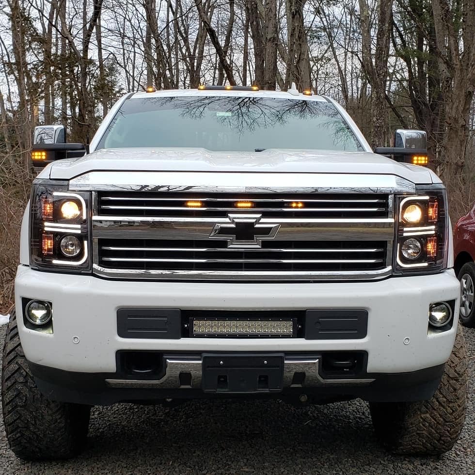 RECON 264296BKC Chevrolet Silverado 2500/3500 Heavy Duty 15-19 (3rd GEN) PROJECTOR HEADLIGHTS w/ Ultra High Power Smooth OLED HALOS & DRL - Smoked / Black